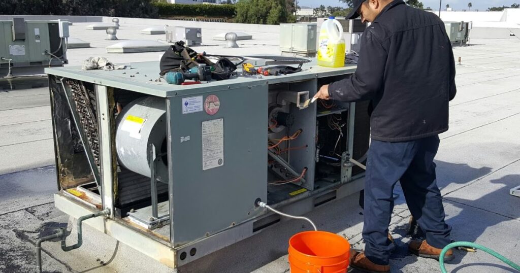 Los Angeles commercial HVAC repair technician servicing rooftop unit 1
